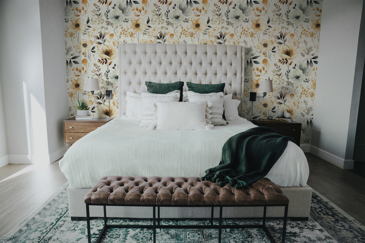 Soft beige and sage floral wallpaper with watercolor wildflowers and botanical foliage on a warm cream background in bedroom