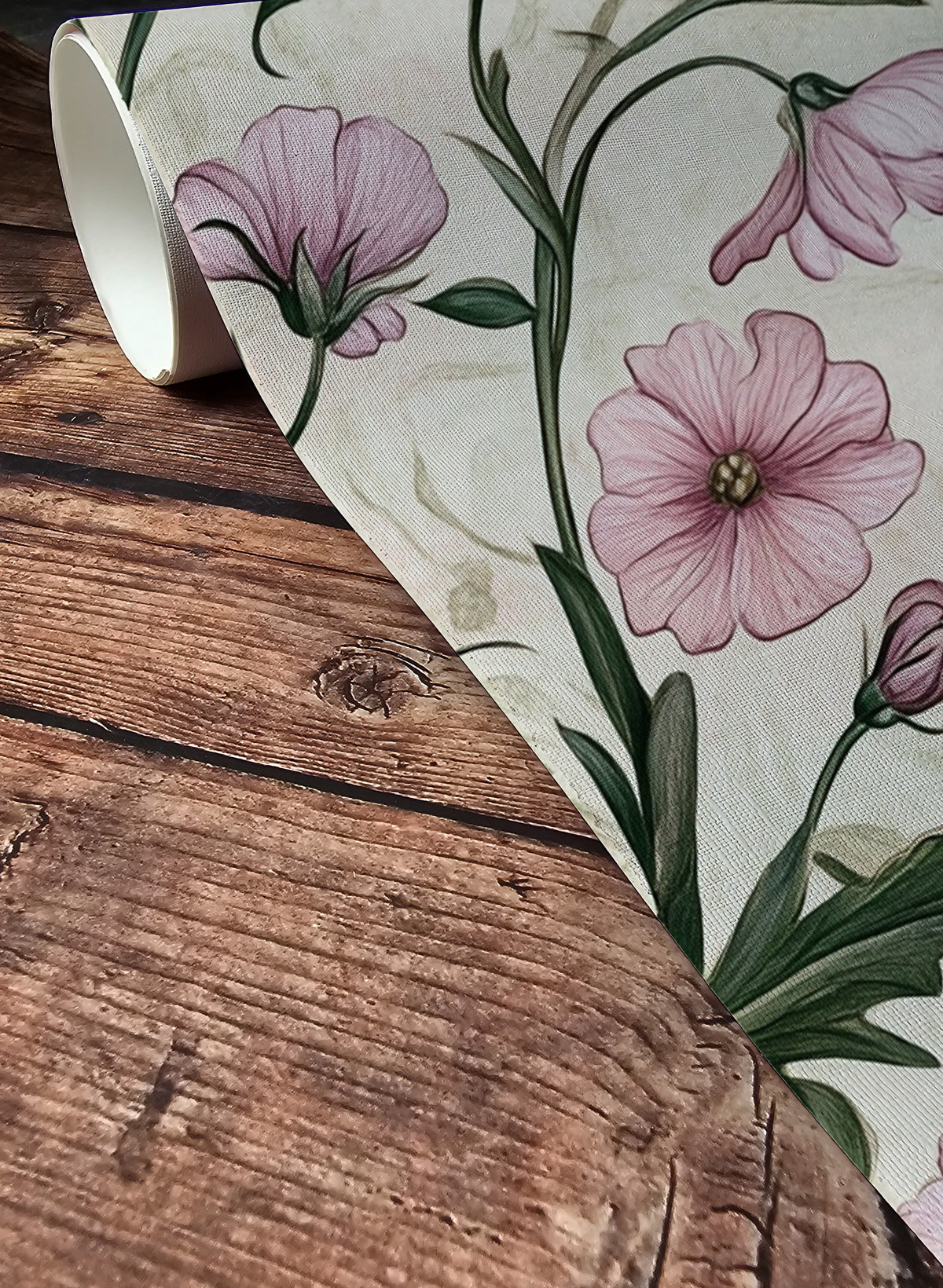 Soft blush floral wallpaper with delicate pink wildflowers and trailing botanical stems on a warm neutral background, cottagecore wallpaper design for bedrooms, nurseries, and romantic interiors, up close