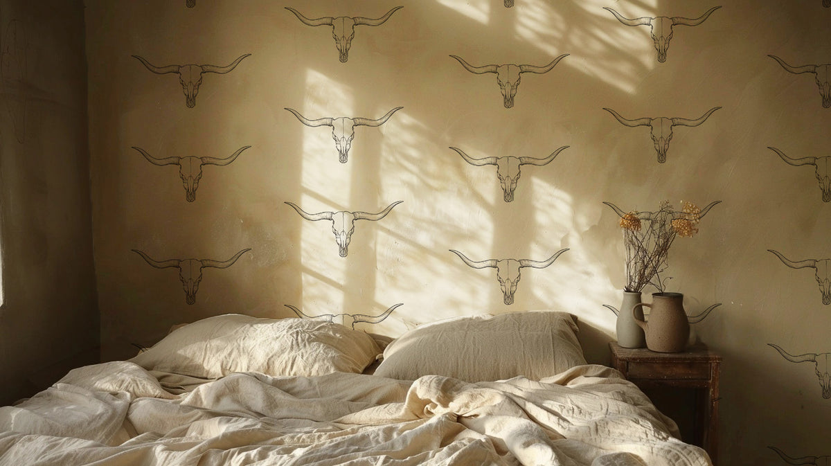 Western longhorn wallpaper featuring minimalist hand-drawn cattle skulls on a warm cream background, creating a modern ranch, western farmhouse, and rustic cowboy aesthetic for entryways, bedrooms, and living spaces