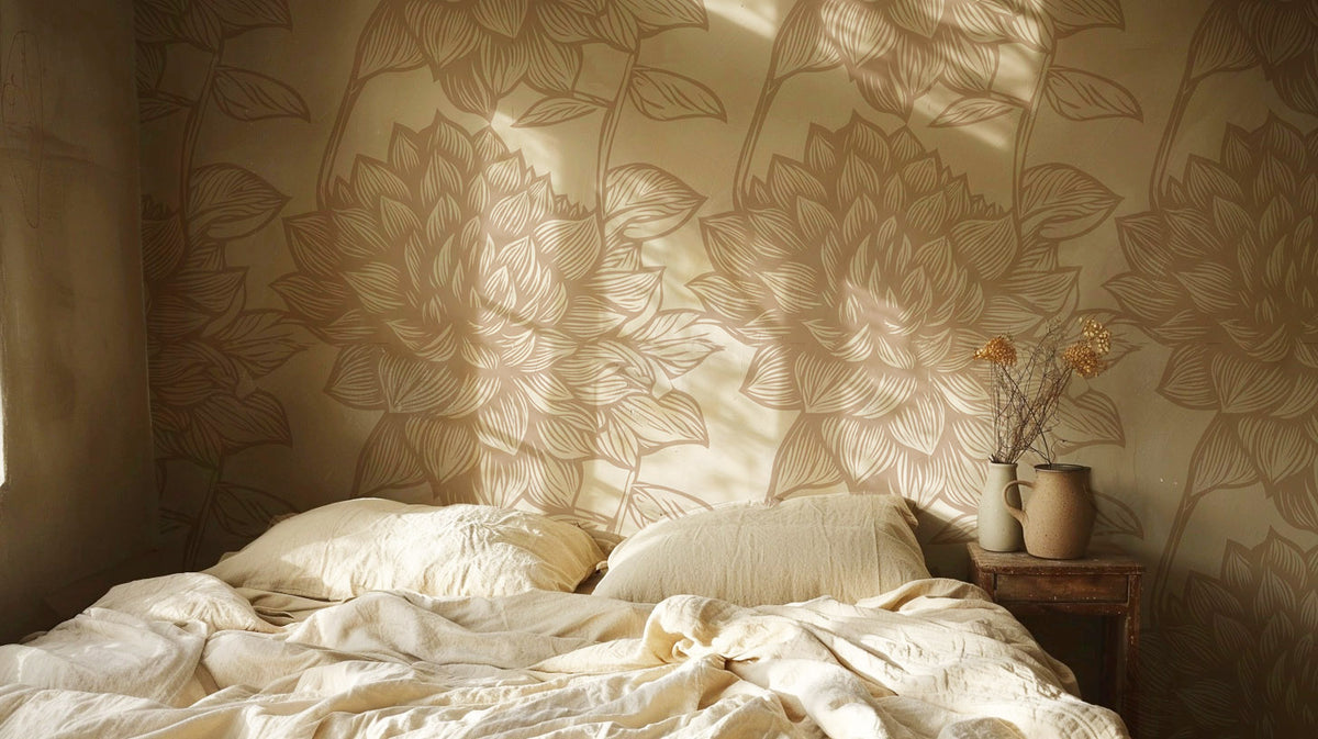 Beige and cream botanical wallpaper with oversized hand-drawn leaves and floral foliage in a soft neutral colour palette in bedroom