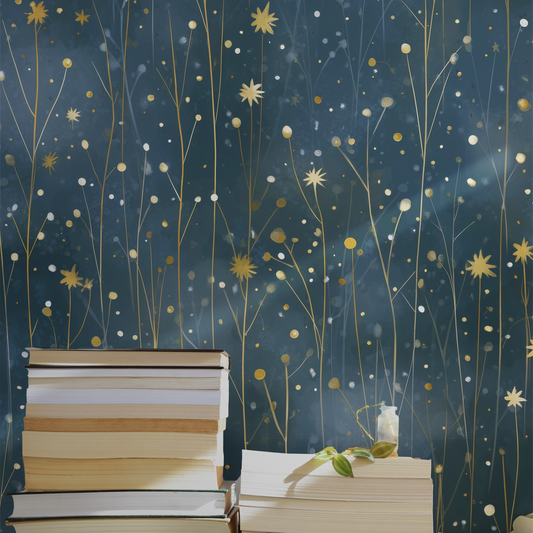 Dark starry meadow wallpaper with delicate wildflower stems and golden stars on a deep blue background on wall