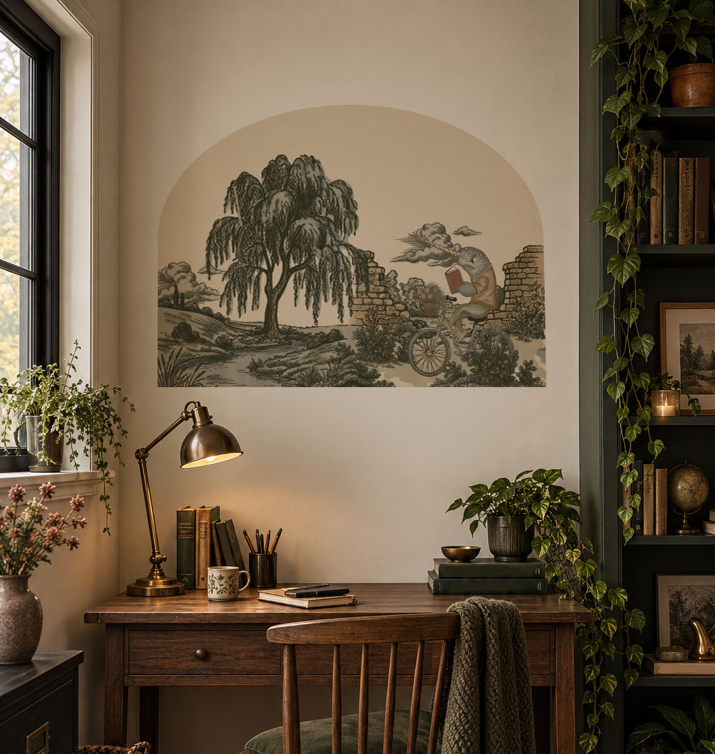 Grumpy narwhal riding a bicycle wall arch decal, whimsical removable wall decor for offices, studios and creative spaces.