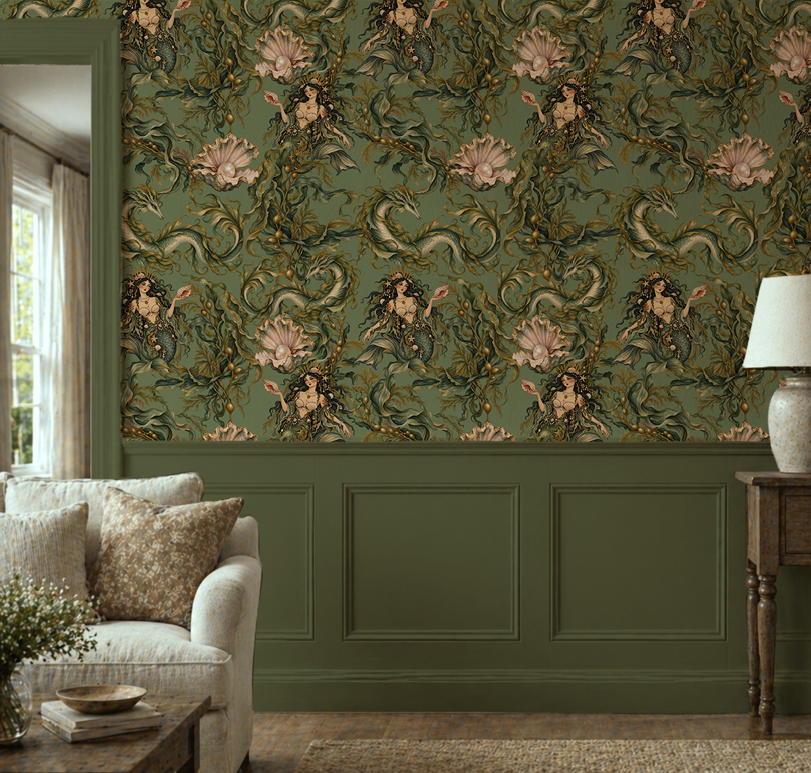 Moody green mythical sea life wallpaper featuring dark-haired sirens, curling sea serpents, flowing seaweed and blush pink oyster shells with pearls in a vintage botanical illustration style in living room.