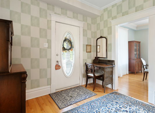 Sage green checkerboard wallpaper featuring soft watercolor squares in muted sage and cream tones, creating a calming modern cottage aesthetic for bedrooms, living rooms, nurseries, and farmhouse-inspired interiors, in entryway