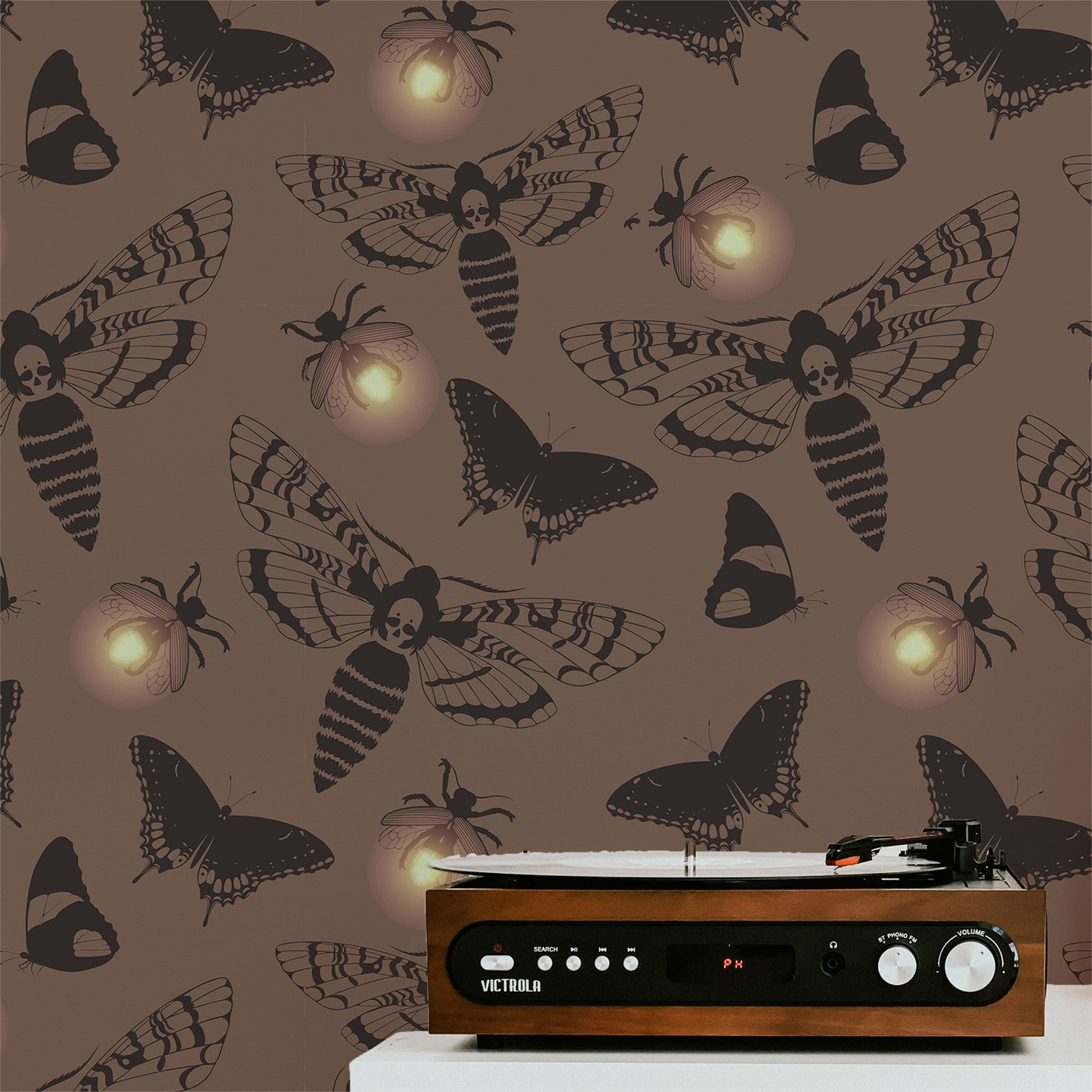 Dark cottagecore wallpaper featuring vintage death's head moths, butterflies, and glowing fireflies on a warm taupe background with peel and stick installation.