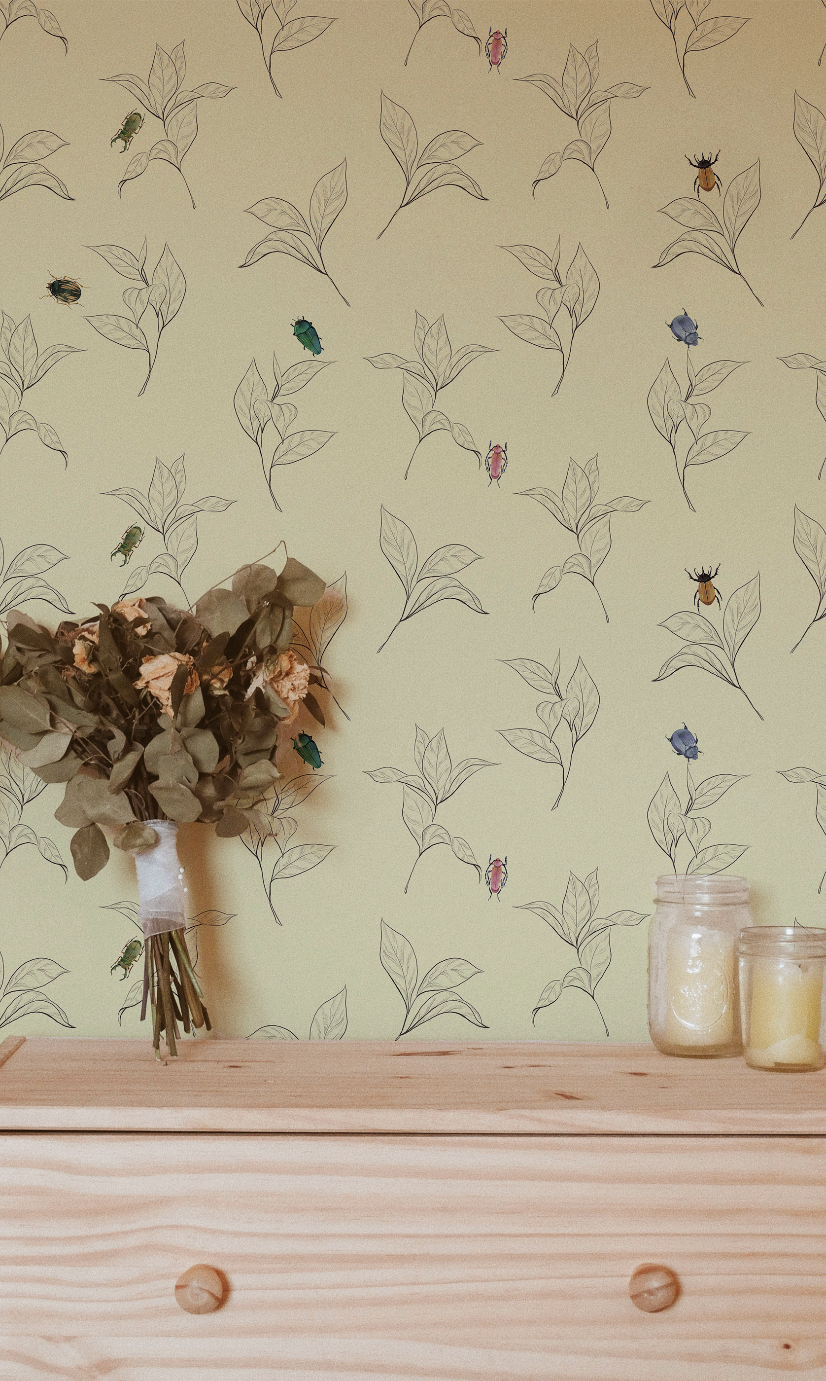 Vintage beetle wallpaper featuring colorful illustrated beetles scattered among delicate hand-drawn botanical leaves on a warm cream background, peel and stick wallpaper for cottagecore and nature-inspired interiors.