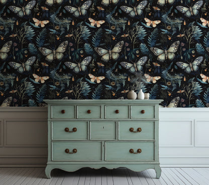 Dark Cottagecore wallpaper with soft vintage moths and shadowed ferns on a black background