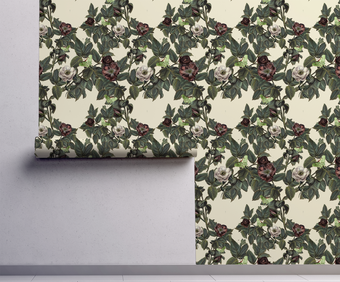 Luna Moth wallpaper with pale green moths, dusty mauve and cream roses, and deep green foliage on a warm ivory background