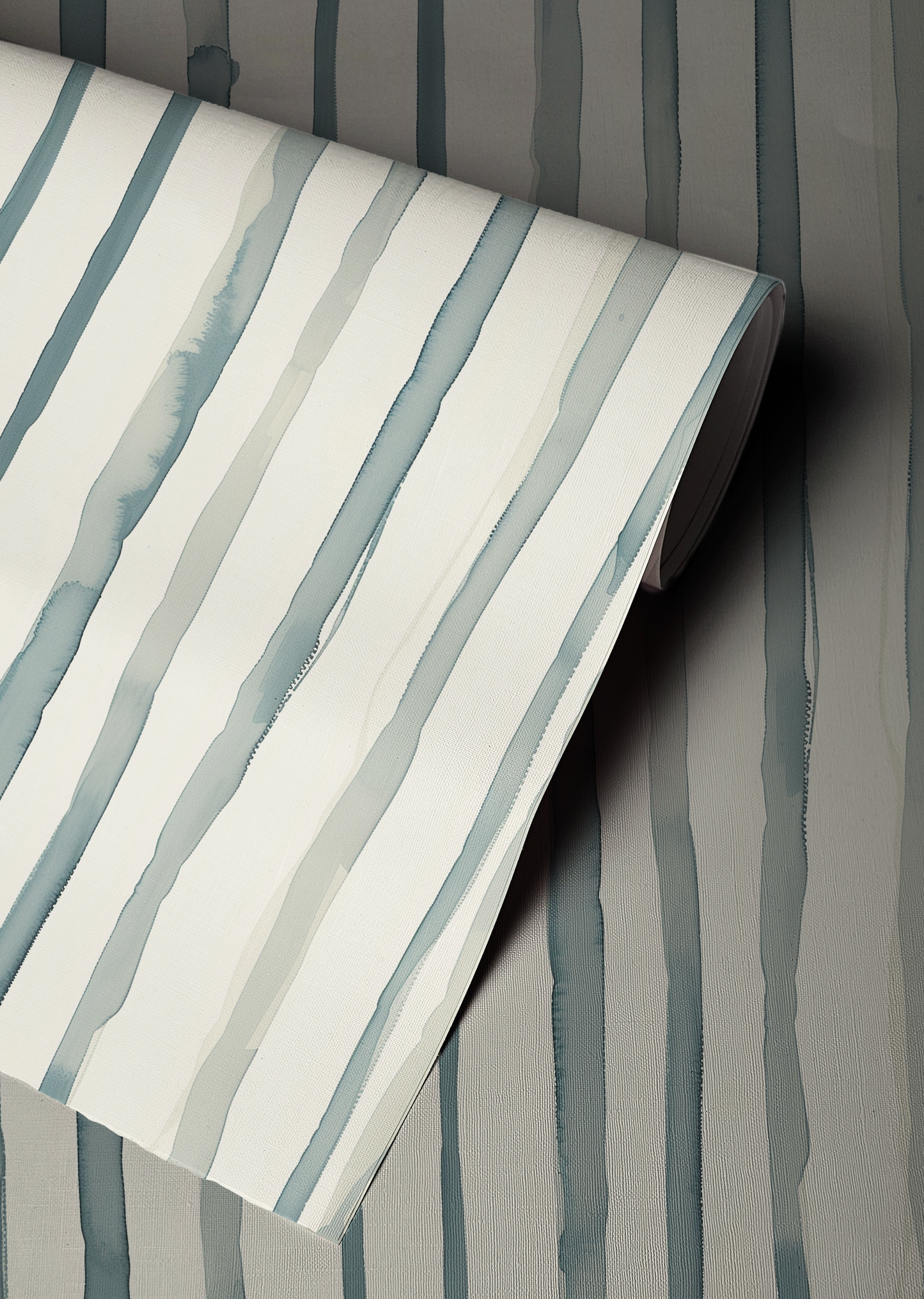 Soft watercolor stripe wallpaper with vertical blue green stripes on a warm neutral background up close