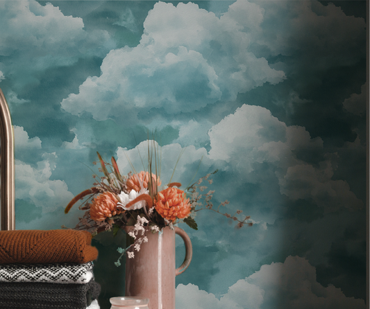 Soft blue cloud wallpaper with dreamy painted clouds in a misty sky pattern On wall