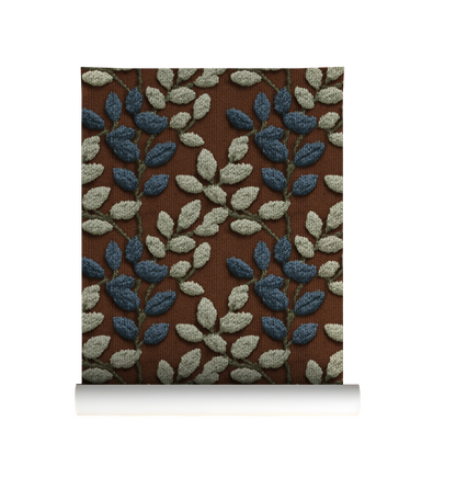 Textured botanical leaf wallpaper with blue and sage leaves on a warm rust background On roll 