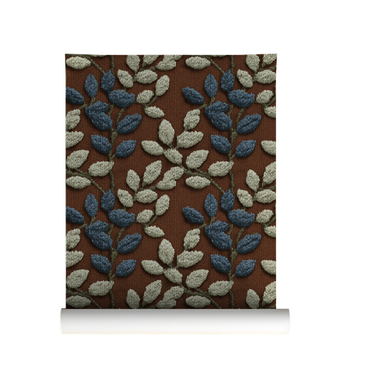 Textured botanical leaf wallpaper with blue and sage leaves on a warm rust background On roll 
