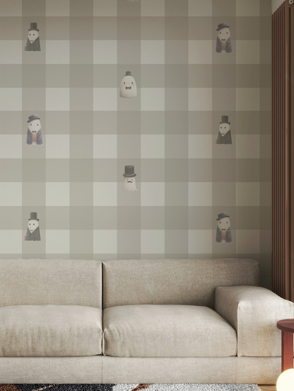 Beige checkerboard peel and stick wallpaper with striped squares and whimsical ghost figures in top hats and suits in living room