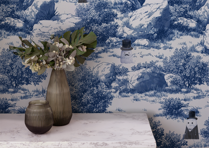 Blue toile peel and stick wallpaper with pastoral landscape, rocks and trees, whimsical ghost characters in vintage top hats in room