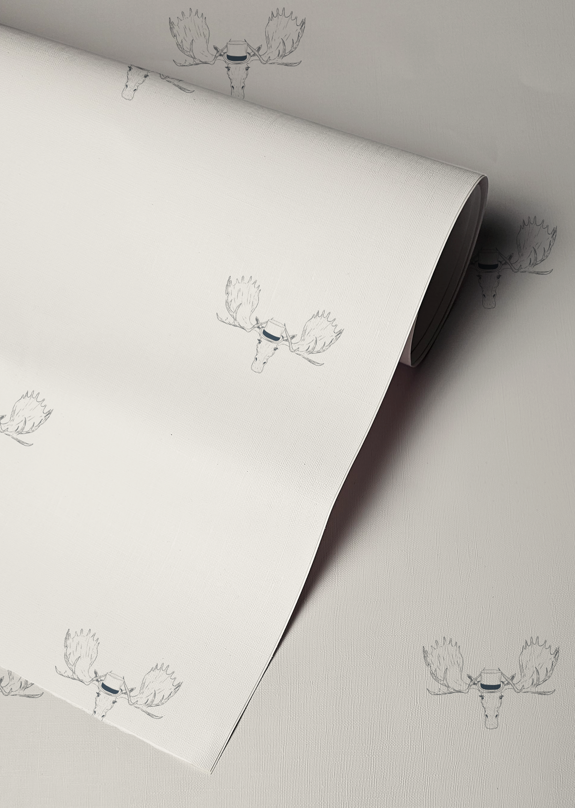 Minimal wallpaper with repeating moose head illustration wearing a top hat, subtle whimsical peel and stick wallpaper pattern up close