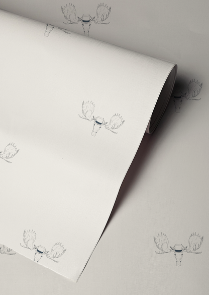 Minimal wallpaper with repeating moose head illustration wearing a top hat, subtle whimsical peel and stick wallpaper pattern up close