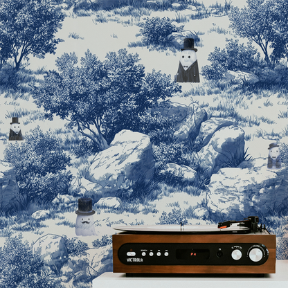 Blue toile peel and stick wallpaper with pastoral landscape, rocks and trees, whimsical ghost characters in vintage top hats on wall