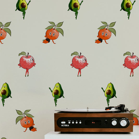Retro fruit wallpaper with quirky pin up style oranges apples and avocados on a neutral background in a playful kitchen interior style