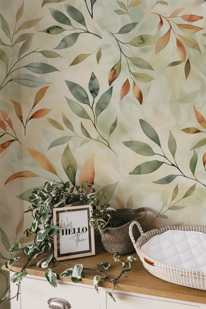 Botanical wallpaper featuring watercolor leaves in sage green, terracotta, and beige tones on a soft neutral background.