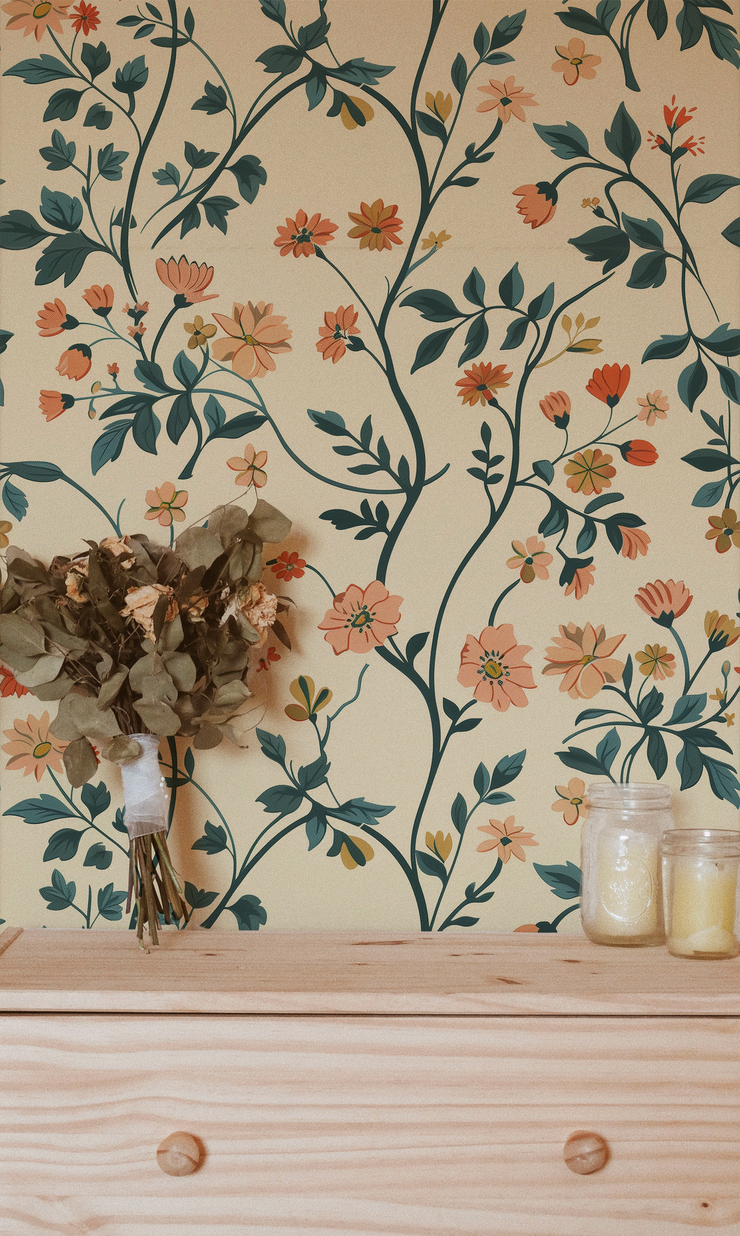 Floral wallpaper featuring peach and coral wildflowers with blue-green botanical vines on a warm cream background in bedroom 