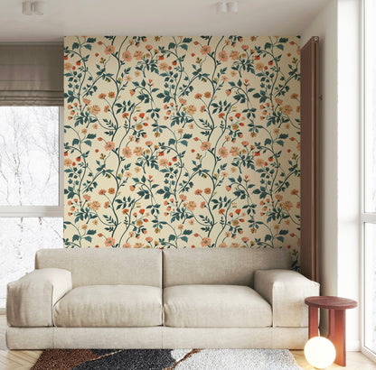Floral wallpaper featuring peach and coral wildflowers with blue-green botanical vines on a warm cream background in living room 