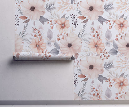Soft watercolor wallpaper with delicate floral blooms and botanical motifs in blush pink and muted grey tones on a warm white background on wall