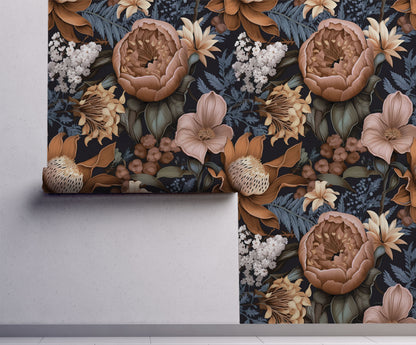 Moody botanical wallpaper with oversized protea, peonies, lilies, and blue foliage on a deep charcoal background on wall