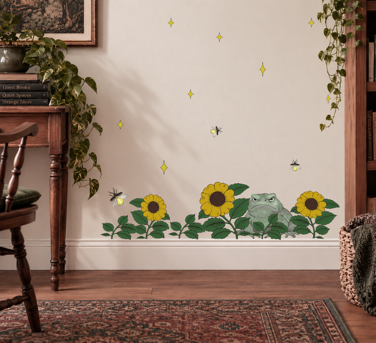 Grumpy frog and wildflower removable wall decal with whimsical storybook design above baseboards