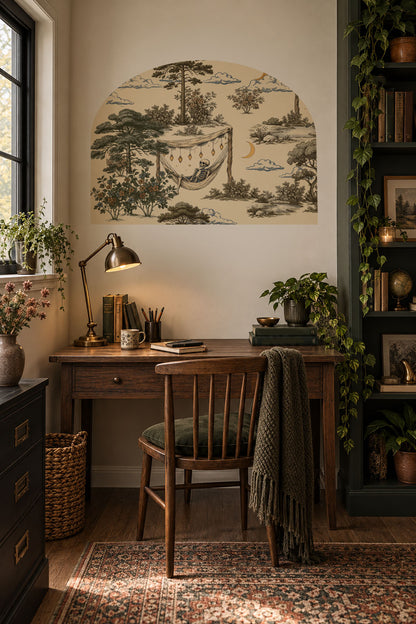 Skeleton relaxing in a hammock wall arch decal, whimsical removable wall decor with dark humor for offices, bedrooms and reading nooks, in library.