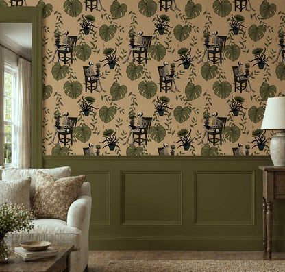 Whimsigoth skeleton botanical peel and stick wallpaper with vintage gardeners and tropical monstera leaves on a cream background  In living room 