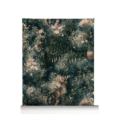 Dark green woodland wallpaper featuring antlered jackalopes surrounded by blush flowers and lush botanical foliage on roll