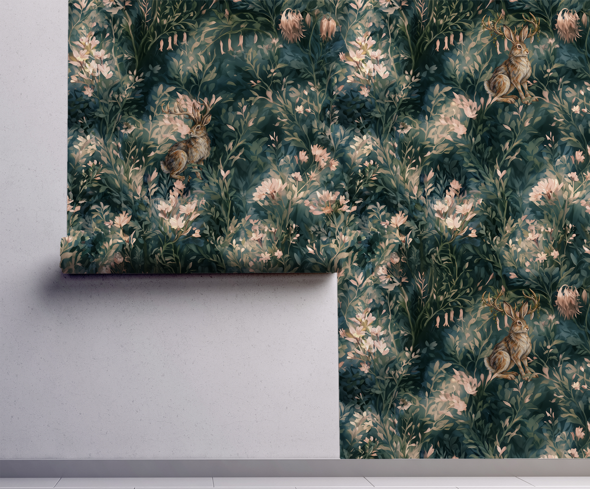 Dark green woodland wallpaper featuring antlered jackalopes surrounded by blush flowers and lush botanical foliage on wall