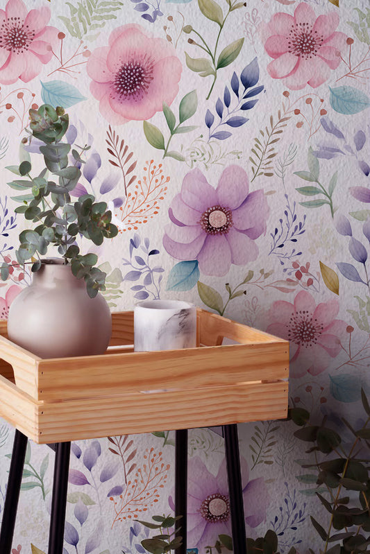 Watercolor floral wallpaper with pink and lavender botanicals on a soft cream background for Cottagecore interiors
