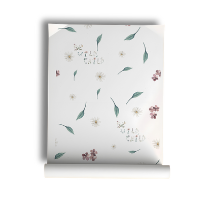 Soft floral nursery wallpaper with delicate wildflowers greenery and whimsical be wild child lettering on a neutral background in a cottagecore style