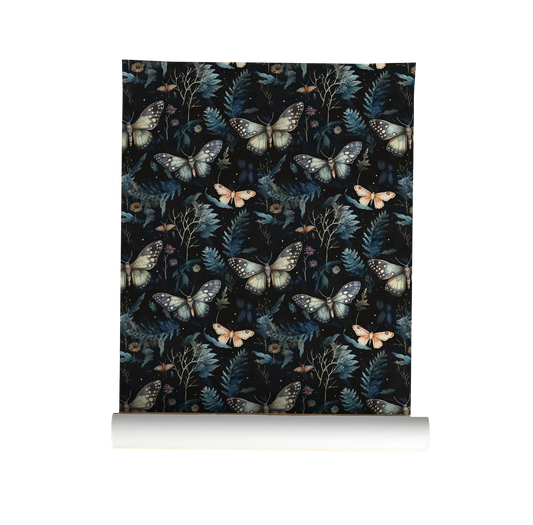 Roll of wallpaper with moth and leaf pattern on a dark background