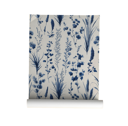 Roll of wallpaper with blue floral pattern on a white background