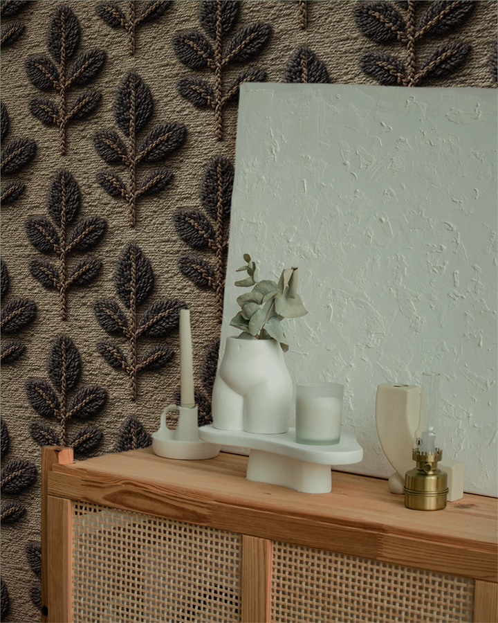 Textured leaf knit wallpaper with embroidered botanical pattern in earthy woodland tones On wall