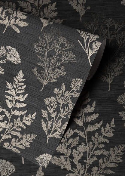 Close-up of dark wallpaper with a subtle floral pattern