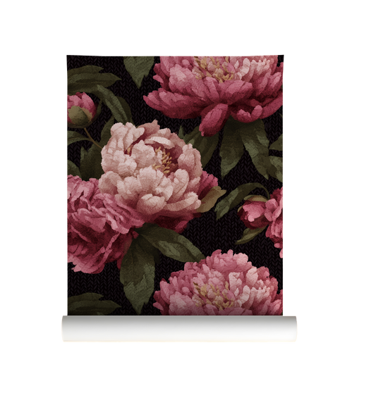 Roll of wallpaper with knitted pink floral design on a black background