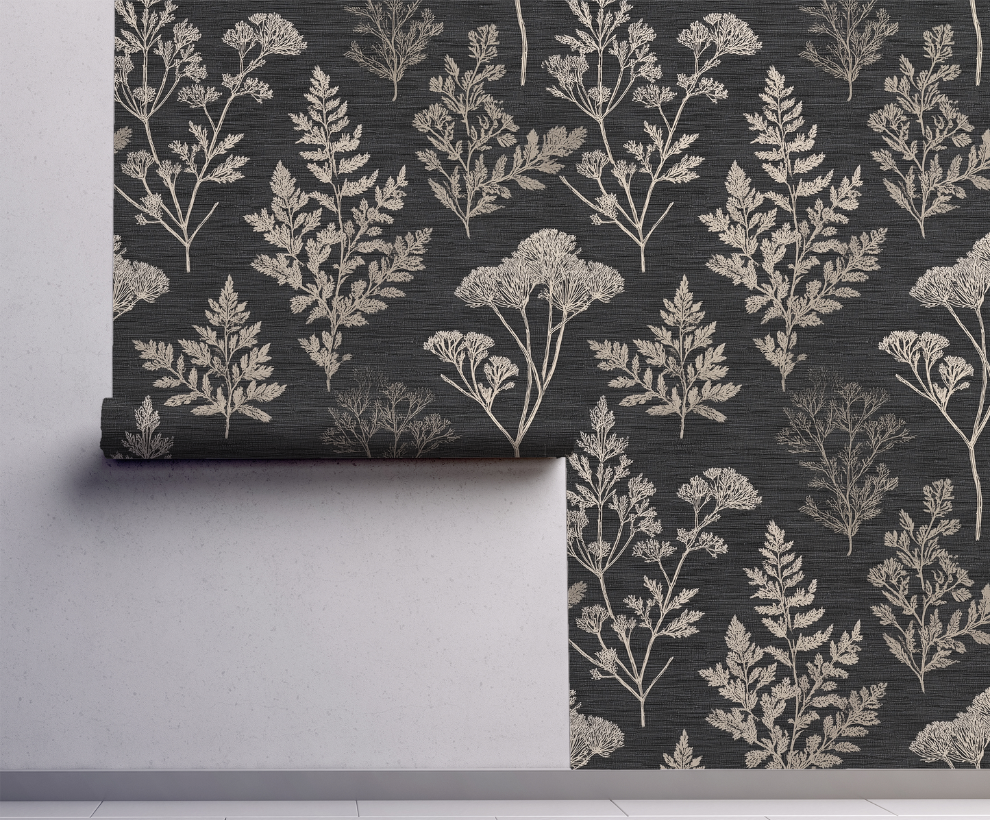 Roll of wallpaper with a floral pattern on a dark background