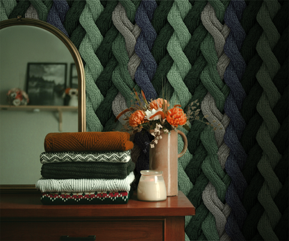 Evergreen cable knit wallpaper with braided knit pattern in layered green tones In room