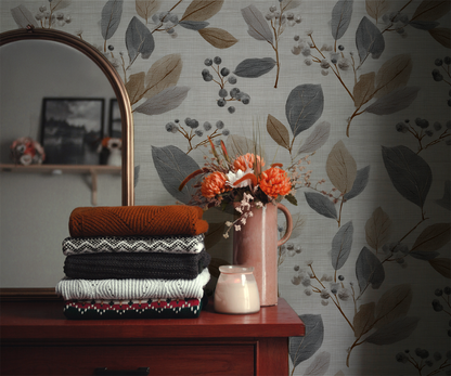 Neutral botanical leaf wallpaper with soft grey and flax colored leaves on a textured linen background In room 