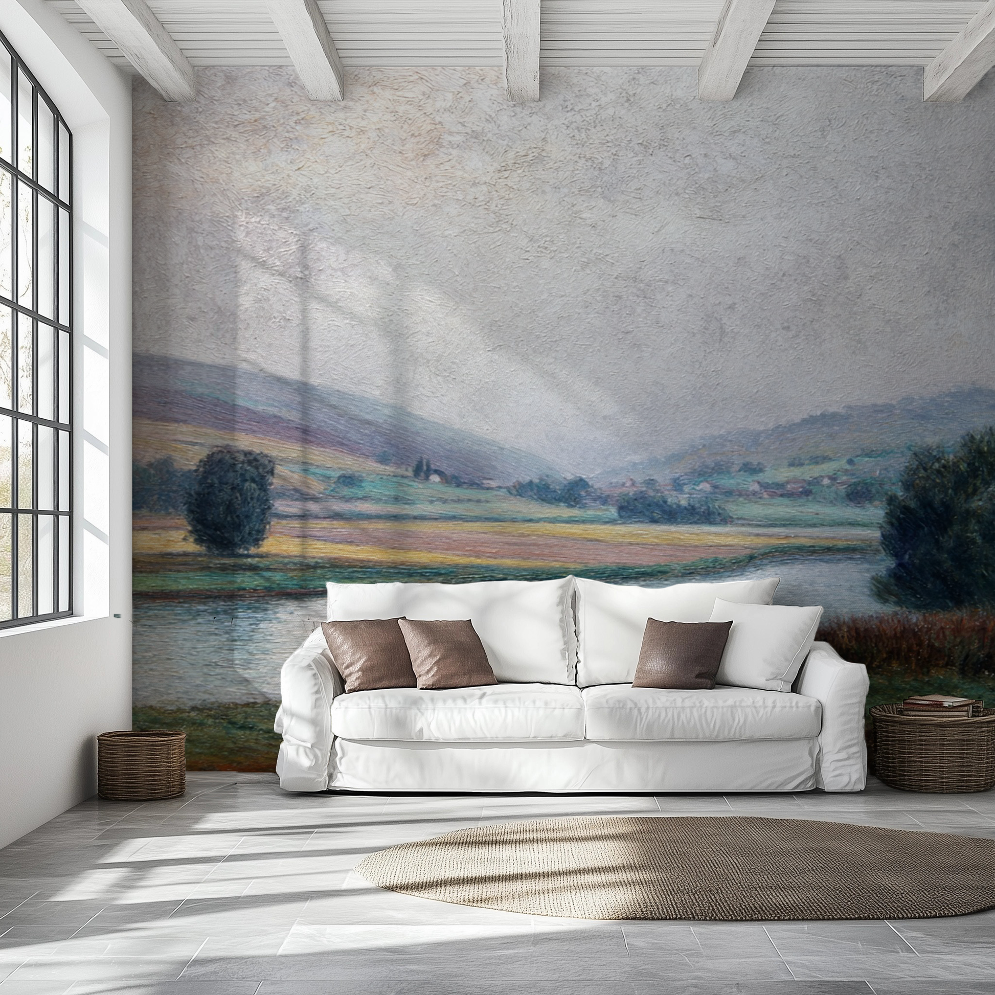 White sofa with brown cushions in a room with a large landscape wall mural