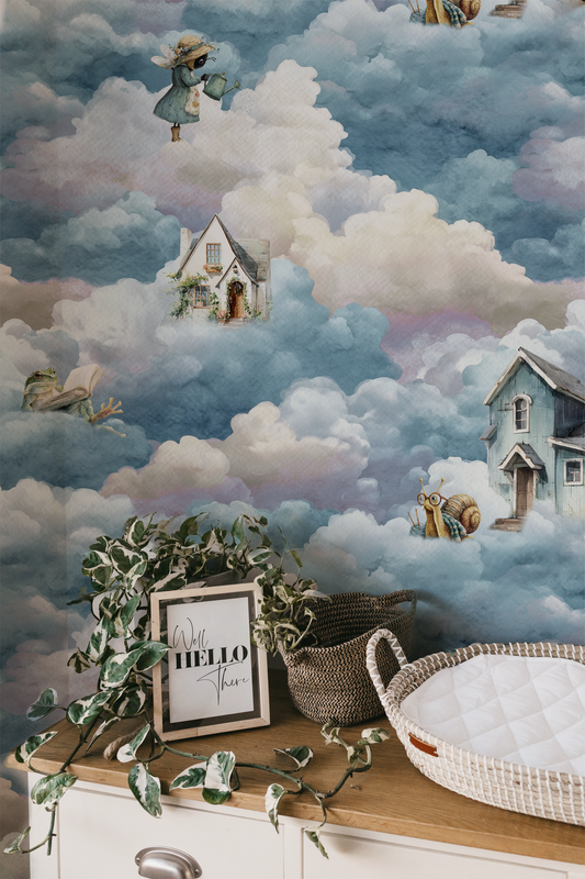 Whimsical cloud wallpaper with floating cottage, bee, snail, and frog among soft blue storybook clouds In room 