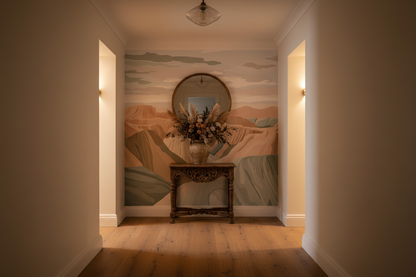 Wall Mural of illustrated landscape with layered terracotta rock formations, sage green valleys, and a pale hazy sky in a soft painterly style, in hallway