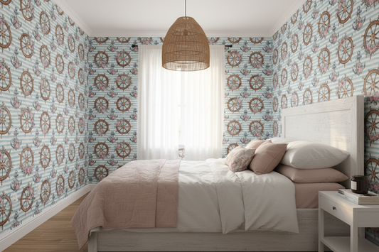 Nautical coastal wallpaper featuring watercolor ship wheels and anchors adorned with pink floral bouquets on soft blue and white striped background in kids room